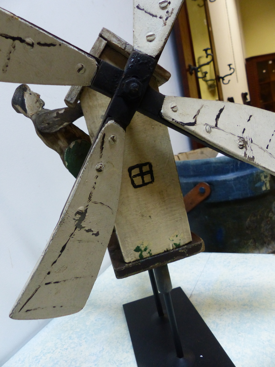 A PAINTED WOOD WEATHER VANE IN THE FORM OF A WINDMILL THE SAILS MOVING A SEGMENTAL FIGURE OF A MAN - Image 4 of 4