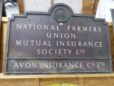 A LARGE ART DECO BRONZE SIGN FOR NATIONAL FARMERS UNION MUTUAL INSURANCE SOCIETY LTD. 109 x 76cms.