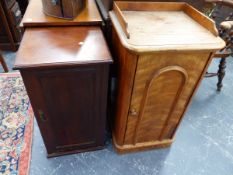 A SATIN BIRCH BEDSIDE CUPBOARD WITH THREEQUARTER GALLERIED TOP ABOVE A DOOR WITH ROUND ARCH PANEL