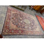 A PERSIAN CARPET OF CLASSICAL DESIGN, 322 x 216cms.