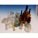 A COLLECTION OF BROWN POISON BOTTLES TOGETHER WITH CLEAR GLASS PHARMACEUTICAL BOTTLES, DROPPERS