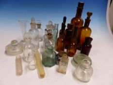 A COLLECTION OF BROWN POISON BOTTLES TOGETHER WITH CLEAR GLASS PHARMACEUTICAL BOTTLES, DROPPERS