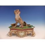 A FRENCH JACOB PETTIT INKSTAND SURMOUNTED BY A DOGUE DE BORDEAUX SEATED ON THE GILT GREEN TOP WITH A