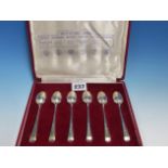 A CASED SET OF SIX HALLMARKED SILVER COFFEE SPOONS.