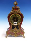 A BOULLE BALLOON SHAPED CLOCK, THE BREVETE PENDULUM TIMEPIECE WITH SKELETON CENTRE TO THE DIAL.