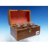 A ROSEWOOD BOX WITH THREE SCENT BOTTLES, THE EDGES OF THE ROUND ARCHED RECTANGULAR LID HOLLY LINE