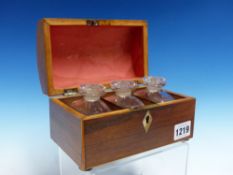 A ROSEWOOD BOX WITH THREE SCENT BOTTLES, THE EDGES OF THE ROUND ARCHED RECTANGULAR LID HOLLY LINE