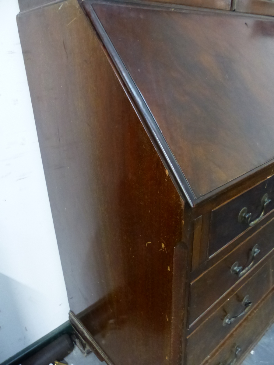 A GEORGIAN STYLE MAHOGANY BUREAU BOOK CASE, THE SHAPED SERPENTINE CORNICE OVER DOORS GLAZED WITH - Image 7 of 14