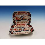A PAIR OF JAPANESE IMARI CANTED RECTANGULAR DISHES DECORATED WITH PAIRS OF FANS. W 18.5cms.