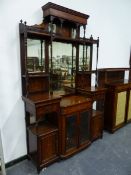 A LATE VICTORIAN ROSEWOOD MIRROR BACKED SIDEBOARD INLAID WITH VASES OF FLOWERS AND WITH SHELVING