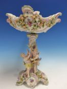 A GERMAN SITZENDORF STANDING BOWL, THE STEM WITH TWO CUPIDS PLAYING AMONGST ENCRUSTED FLOWERS. H.
