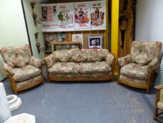 AN ERCOL ELM FRAMED THREE PIECE SUITE.