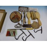 FOUR IVORY BACKED BRUSHES, VARIOUS BOOT PULLS, PICKLE FORKS, TWO POSTCARDS AND OTHER ITEMS.