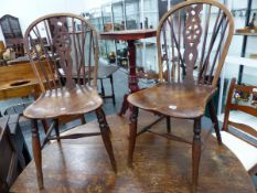 A PAIR OF 19th.C.COUNTRY ELM SEAT WHEELBACK CHAIRS. (2)