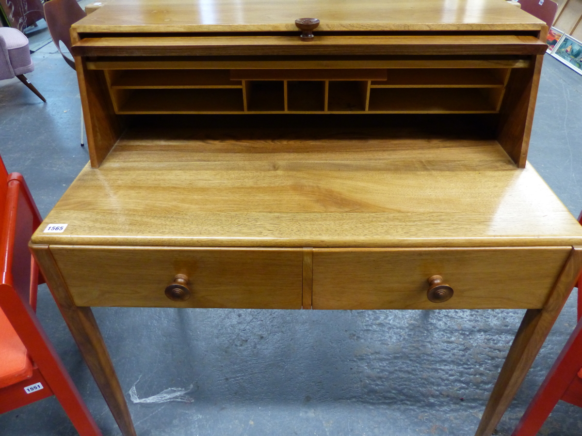 A GORDON RUSSELL WALNUT WRITING TABLE WITH RISING COVER ENCLOSING PIGEON HOLES. 92 x 56 x H.100cms. - Image 2 of 4