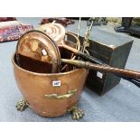 A TWIN HANDLED COPPER AND BRASS LOG BIN WITH PAW FEET TOGETHER WITH A VINTAGE SIX DRAWER TABLE TOP