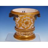 A CHAMBERLAIN'S WORCESTER BROWN MASKED HANDLED PLANTER AND STAND, GILT WITH FOLIAGE SCROLLS. H.