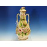 A STAFFORDSHIRE FLORAL ENCRUSTED TWO HANDLED BOTTLE VASE. H.30cms.