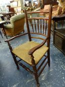 A SET OF EIGHT COUNTRY DINING CHAIRS INCLUDING TWO WITH ARMS, EACH BACK WITH FIVE BALUSTER