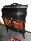 A 19th.C.REGENCY STYLE BLACK PAINTED SIDE CABINET, THE TOP WITH TWO SHELVES, THE GRILLED DOORS ABOVE