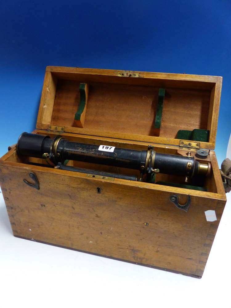 A LARGE TROUGHTON & SIMS THEODOLITE IN TRANSIT CASE TOGETHER WITH A TRIPOD AND LEVELLING STAFF.