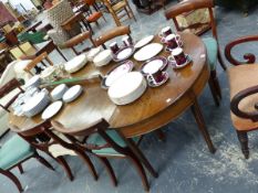 A GEORGIAN AND LATER MAHOGANY D-END DINING TABLE WITH TWO LEAVES. THE APRON ENDS EACH ON FOUR