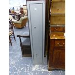 A CLAY SHOOTERS SUPPLIES STEEL GUN CABINET, THE DOOR WITH TWO LOCKS. W 31 x D 28 x H 152.5cms.