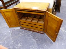 A 19th.C.YEW WOOD AND SATINWOOD TWO DOOR COLLECTOR'S CABINET WITH PANEL DOORS ENCLOSING SLIDES ON