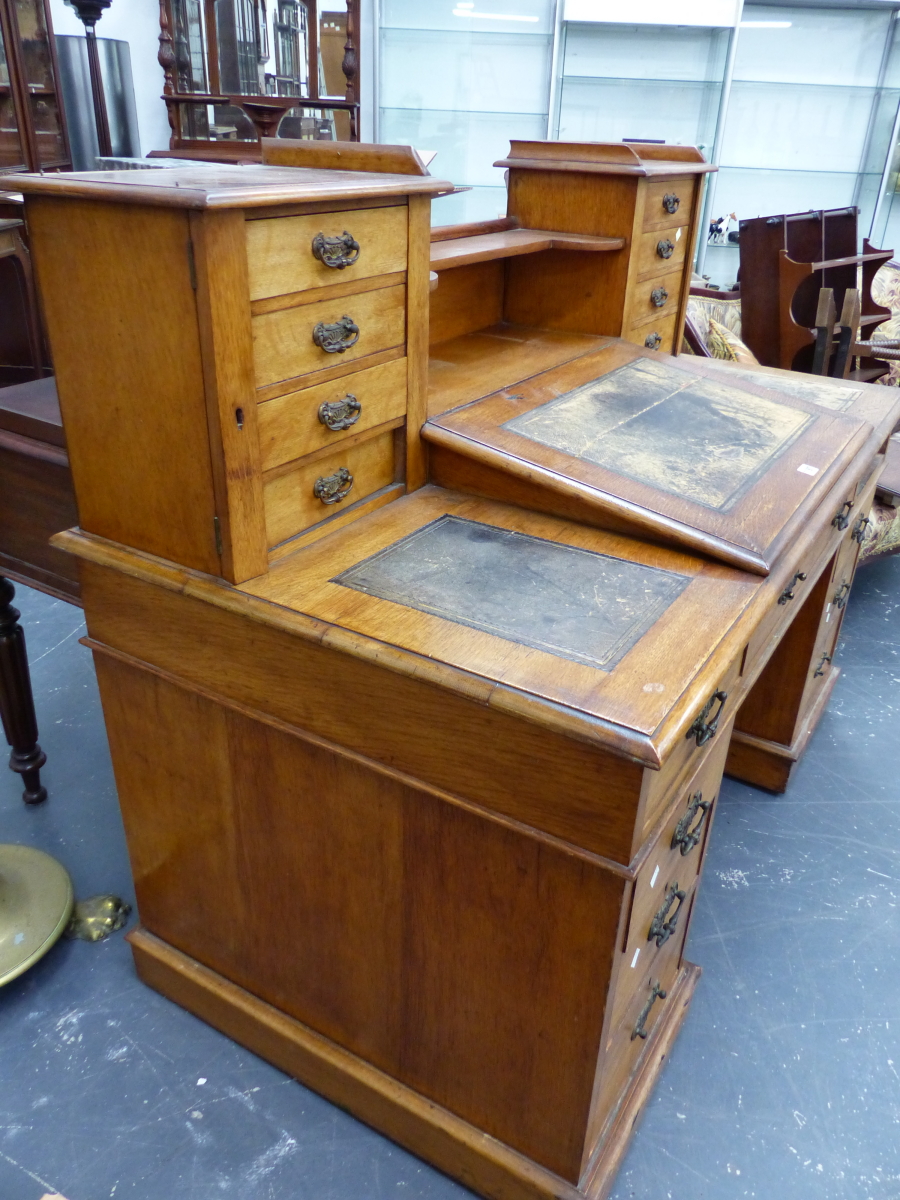 AN OAK PEDESTAL DICKENS DESK, THE LEATHER INSET FALL FLANKED BY FURTHER INSETS BEFORE - Image 9 of 9