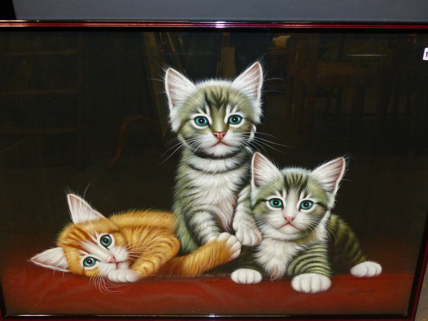 A PASTEL PICTURE OF THREE PLAYFUL KITTENS, SIGNED INDISTINCTLY. 65 x 93cms.