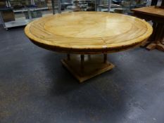 A FAUX MARBLE TOPPED CIRCULAR TABLE WITH PAINTED BAMBOO EDGE ABOVE FOUR BAMBOO COLUMNS AND SQUARE