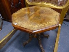 A CARVED AND INLAID VICTORIAN WALNUT OCTAGONAL CENTRE TABLE. Dia.76cms.