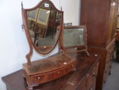 A REGENCY MAHOGANY AND BOX INLAID SHIELD FORM SWING MIRROR WITH THREE DRAWER BASE TOGETHER WITH