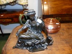 AN ANTIQUE PATINATED FIGURE OF A SEATED CLASSICAL MAIDEN TOGETHER WITH A SILVER RIMMED DOULTON