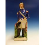 A STAFFORDSHIRE POTTERY FIGURE OF LOUIS NAPOLEON. H.39cms.