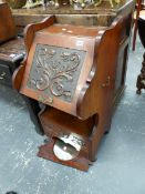 A LATE VICTORIAN MAHOGANY COAL PURDONIUM WITH DRAWER TO BASE AND RAISED MIRROR BACK.