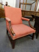 AN ANTIQUE GEORGIAN LARGE GAINSBOROUGH OPEN ARMCHAIR, ON SQUARE LEGS UNITED BY STRETCHER. W.68 X H.