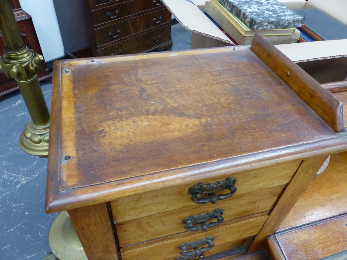 AN OAK PEDESTAL DICKENS DESK, THE LEATHER INSET FALL FLANKED BY FURTHER INSETS BEFORE - Image 5 of 9