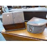 A VICTORIAN OAK STATIONERY BOX, THE SLOPING DOORS ENCLOSING COMPARTMENTS AND TWO INKWELLS. W