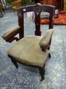 A LATE VICTORIAN MAHOGANY DESK ARMCHAIR WITH LEATHER UPHOLSTERY. SEAT HEIGHT 50cms.