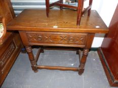 A SMALL OAK SIDE TABLE WITH FRIEZE DRAWER AND STRETCHER BASE. 82 x 43 x H.70cms.