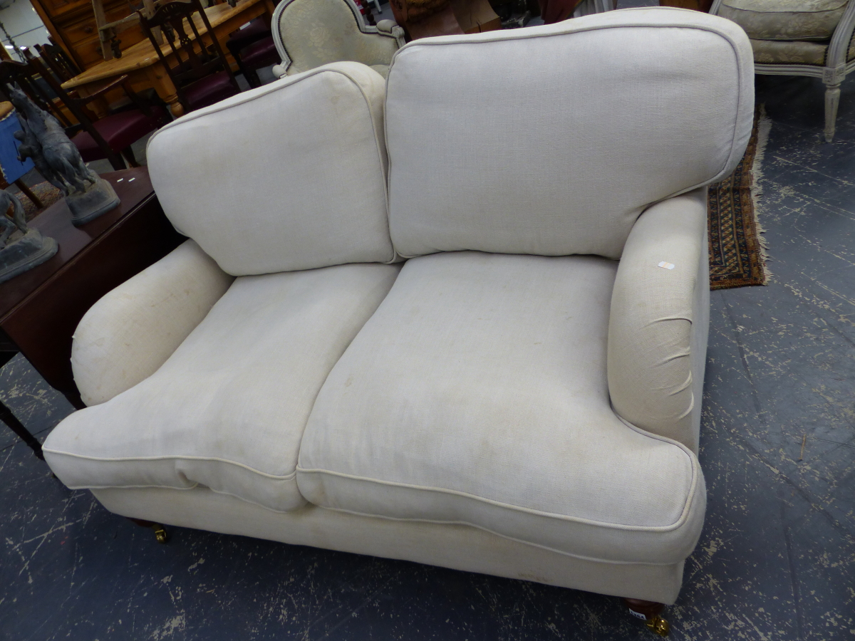 A MODERN HOWARD STYLE TWO SEATER SETTEE, A SIMILAR DEEP SEAT ARMCHAIR AND A LARGE FOOTSTOOL. (3) - Image 4 of 5