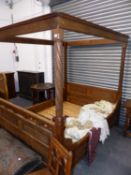 A 19th.C.FRENCH OAK FOUR POSTER BED WITH PANEL HEAD AND FOOT BOARDS. W.164 x L.206 x H.200cms.