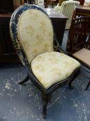 A VICTORIAN PAPIER MACHE INLAID WITH MOTHER OF PEARL NURSING CHAIR, THE UPHOLSTERED HOOP BACK