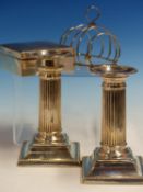 A PAIR OF HALLMARKED SILVER DWARF CANDLESTICKS WITH LOADED BASES HEIGHT 13cms ,DATED 1894, FOR