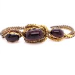 AN ANTIQUE VICTORIAN GOLD AND CARBUNCLE GARNET WOVEN BRACELET. LENGTH 19cms.