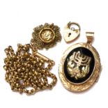 A 14K GOLD EARLY 20th C. JUDAICA MENORAH GOLD AND ONYX LOCKET SUSPENDED ON A 15ct GOLD VICTORIAN