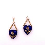 A PAIR OF VICTORIAN BLUE ENAMEL AND SEED PEARL ARTICULATED HEART DROP EARRINGS. THE 3D HEARTS