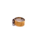 AN 18ct GOLD WIDE TWO COLOUR GOLD DIAMOND SET RING. ONE HALF YELLOW GOLD THE OTHER WHITE COMPLETE