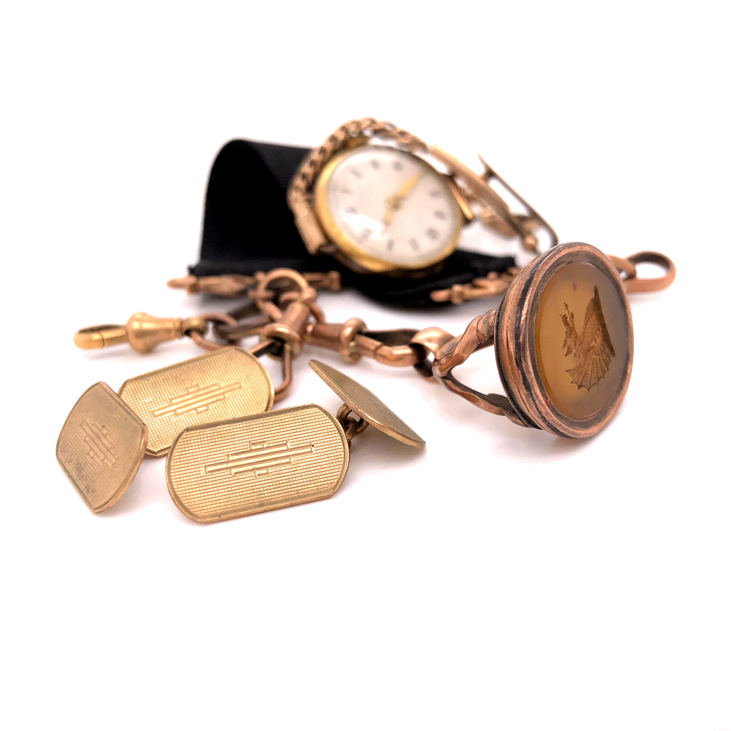 AN 18ct GOLD COCKTAIL WATCH FITTED WITH A 9ct GOLD BRACELET STRAP, A PAIR OF 9ct GOLD CUFFLINKS,